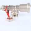Two pressure gauges and a valve on a white surface. Manifold drain valves with auto air vent for Water Underfloor Heating system.