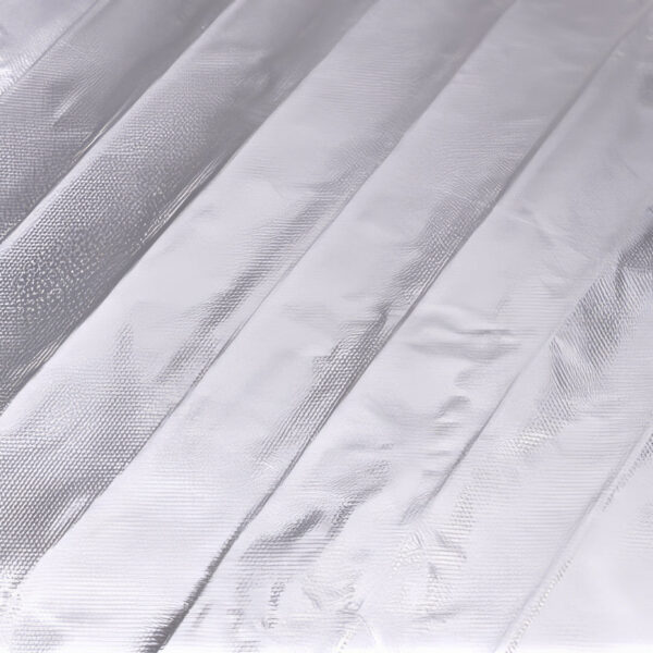 Detailed view of metallic silver foil sheet, designed for electric heating purposes.